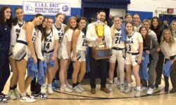 A group of people posing for a photo at the St. Joseph Borough President's Cup.